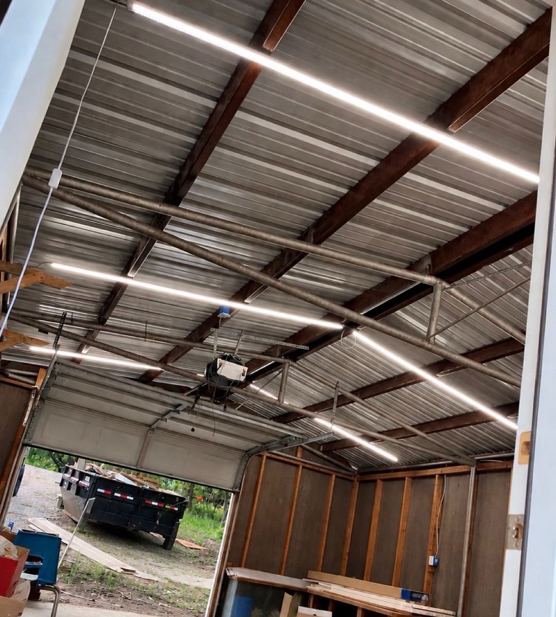 Shop interior with finished metal roof and new LED lighting